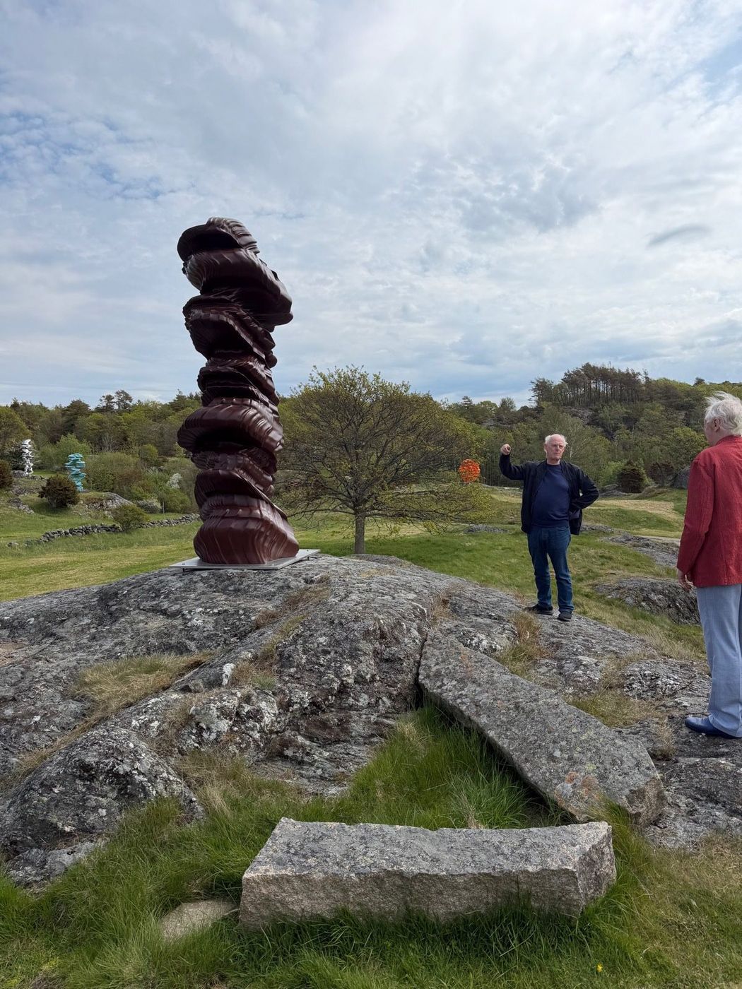 Tony Cragg, Rational Beings — bronze with a red patina.