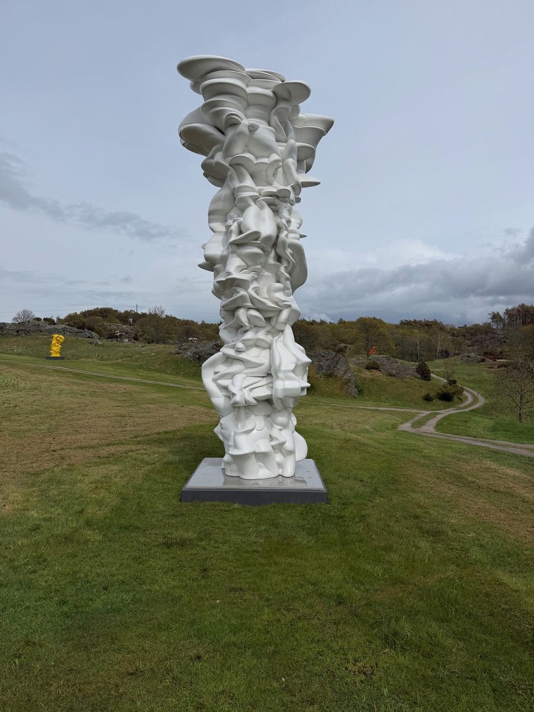 Tony Cragg, lacquered column in brilliant white.